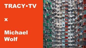 TRACY•TV X Michael Wolf, met linkse tekst op oranje achtergrond, rechts een woondicht gebouw