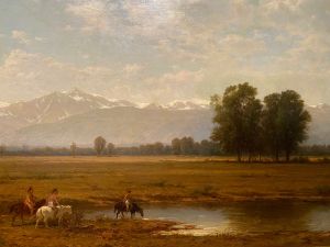 Inheemse Amerikanen te paard in een landschap met bergen en bomen, een rivier met weerspiegeling.