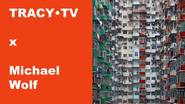 TRACY•TV X Michael Wolf, met linkse tekst op oranje achtergrond, rechts een woondicht gebouw